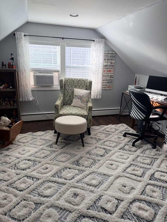 26 Colonial Road Peabody, MA 01960 - Photo 17 of 25 a living room with a couch and a window