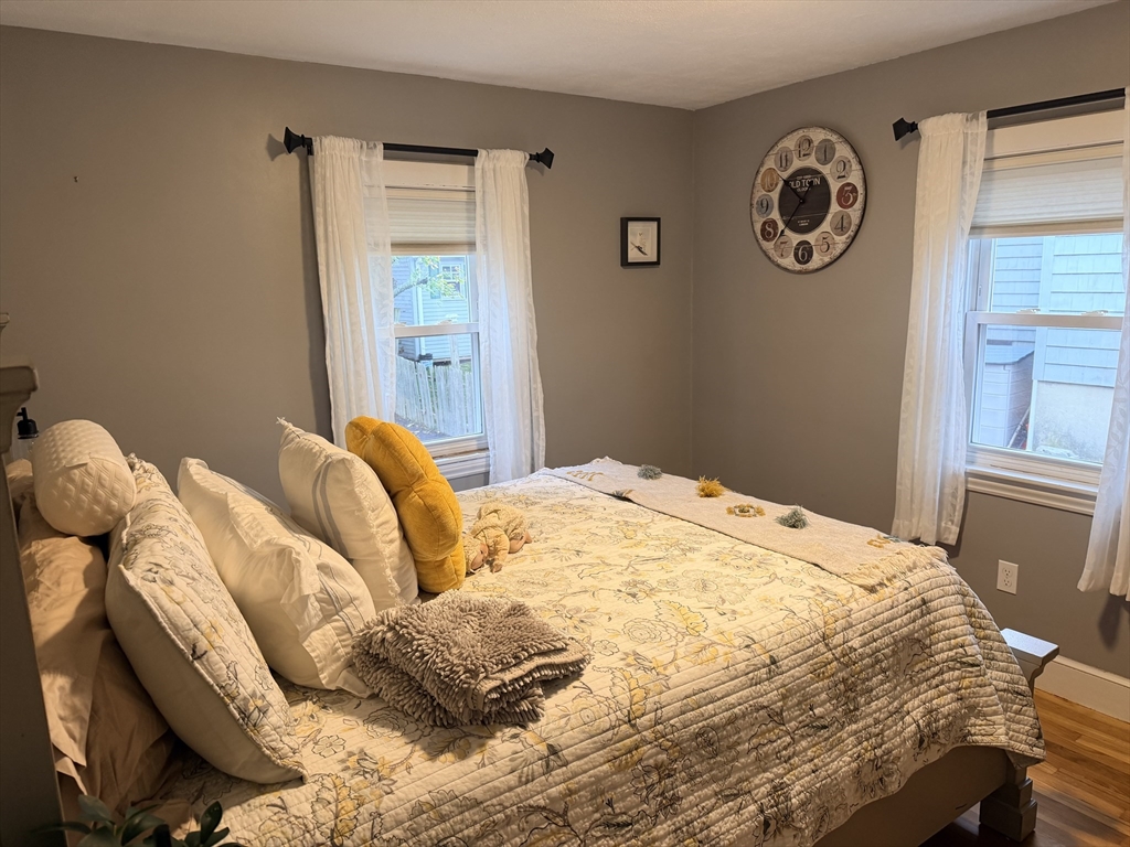 26 Colonial Road Peabody, MA 01960 - Photo 9 of 25 a bedroom with a bed and a window