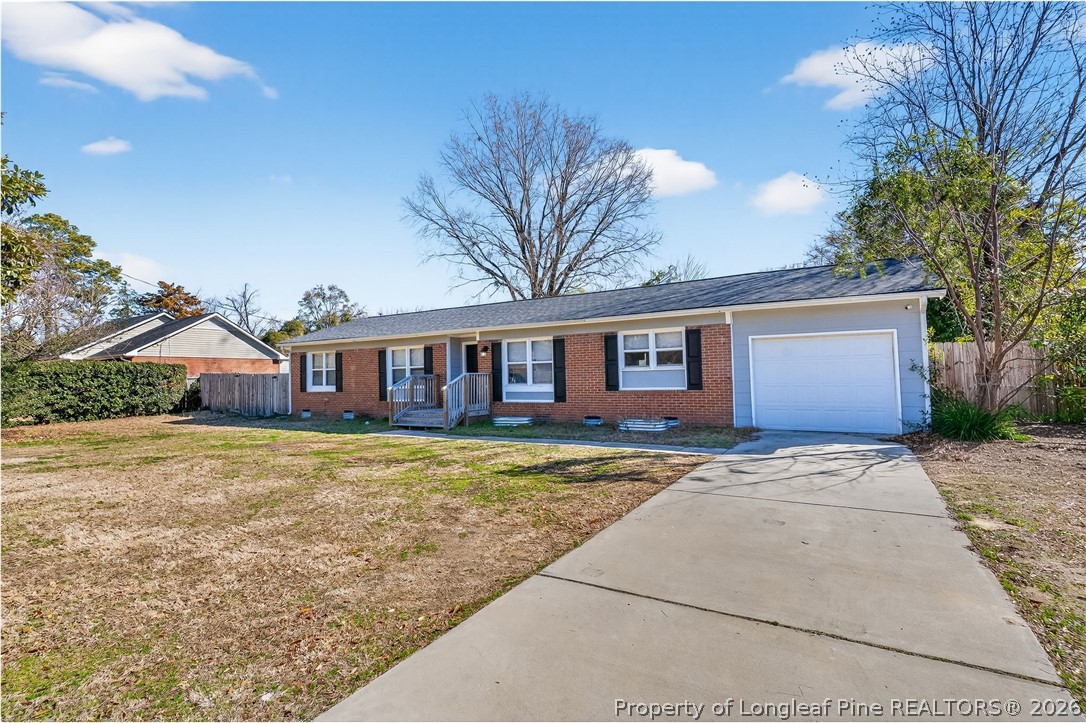 1083 Strickland Bridge Road Fayetteville, NC 28304 - Photo 14 of 25 a front view of a house with yard