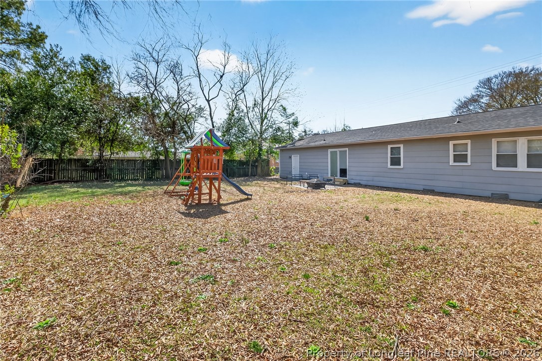 1083 Strickland Bridge Road Fayetteville, NC 28304 - Photo 18 of 25 a house view with a garden space