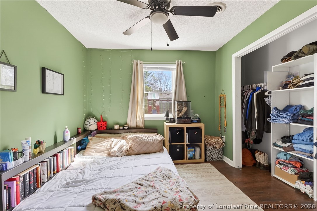 1083 Strickland Bridge Road Fayetteville, NC 28304 - Photo 7 of 25 a bedroom with furniture and a window