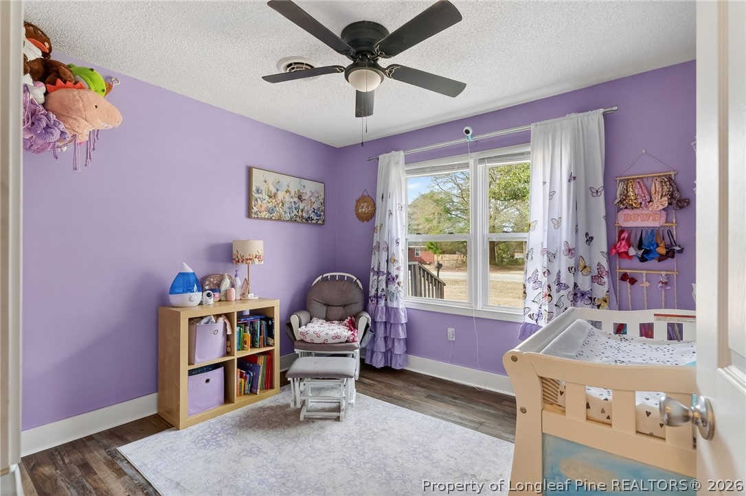 1083 Strickland Bridge Road Fayetteville, NC 28304 - Photo 8 of 25 a living room with furniture and a window
