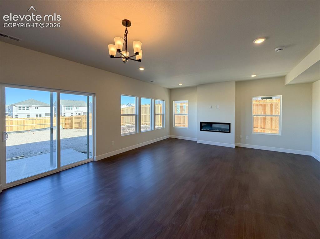 8206 Lemon Grass Road Peyton, CO 80831 - Photo 5 of 33 Open concept dining/living room
