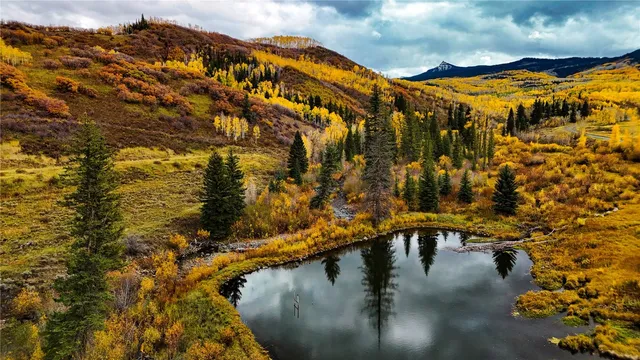 a view of swimming pool with outdoor seating