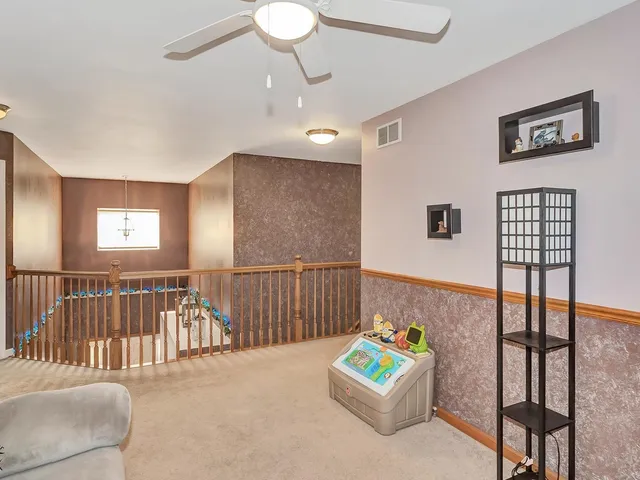 a view of outdoor kitchen and living room