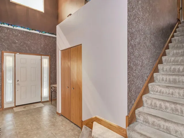 a view of an entryway with staircase