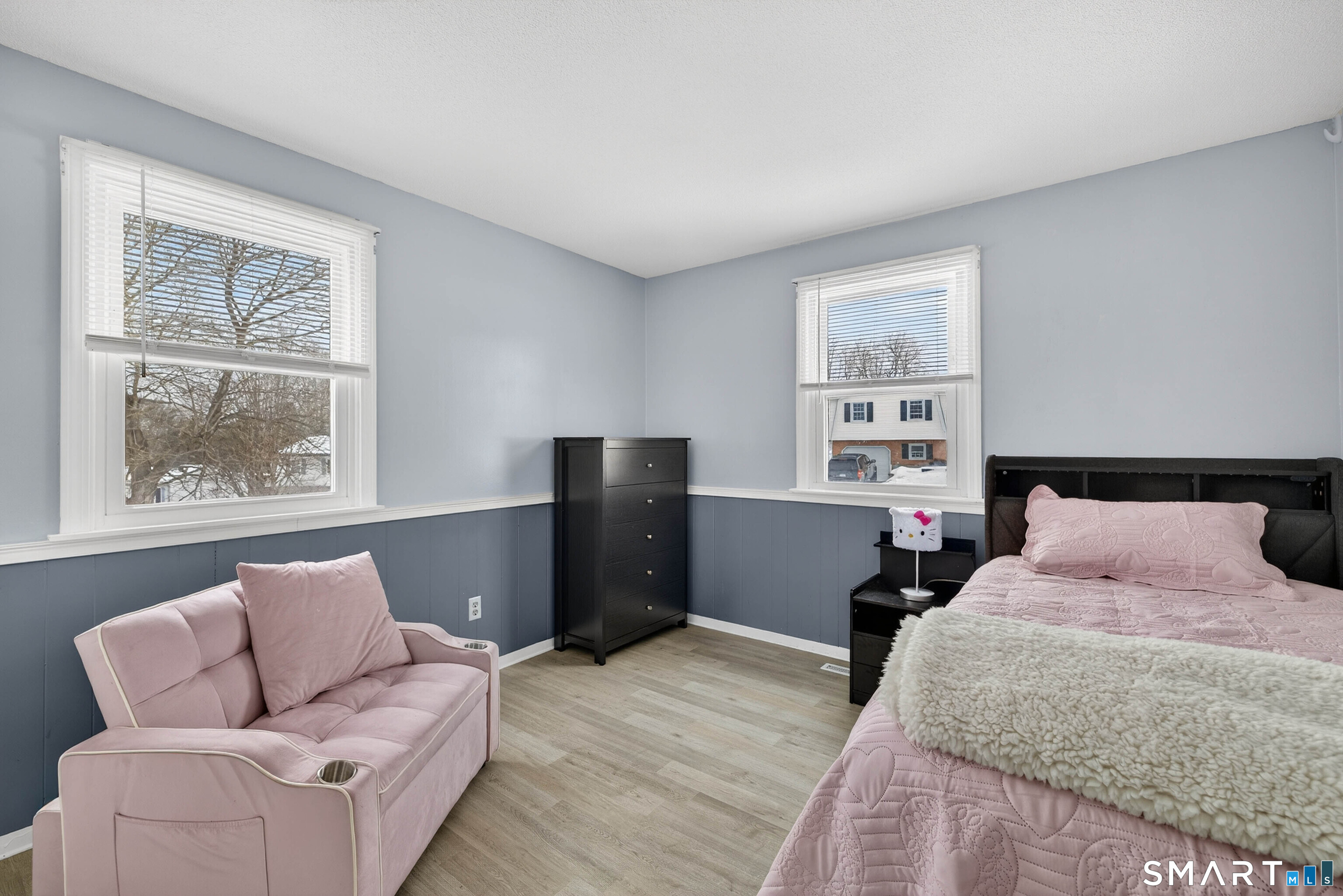 63 Spice Hill Drive Meriden, CT 06451 - Photo 12 of 30 a bedroom with a bed and wooden floor