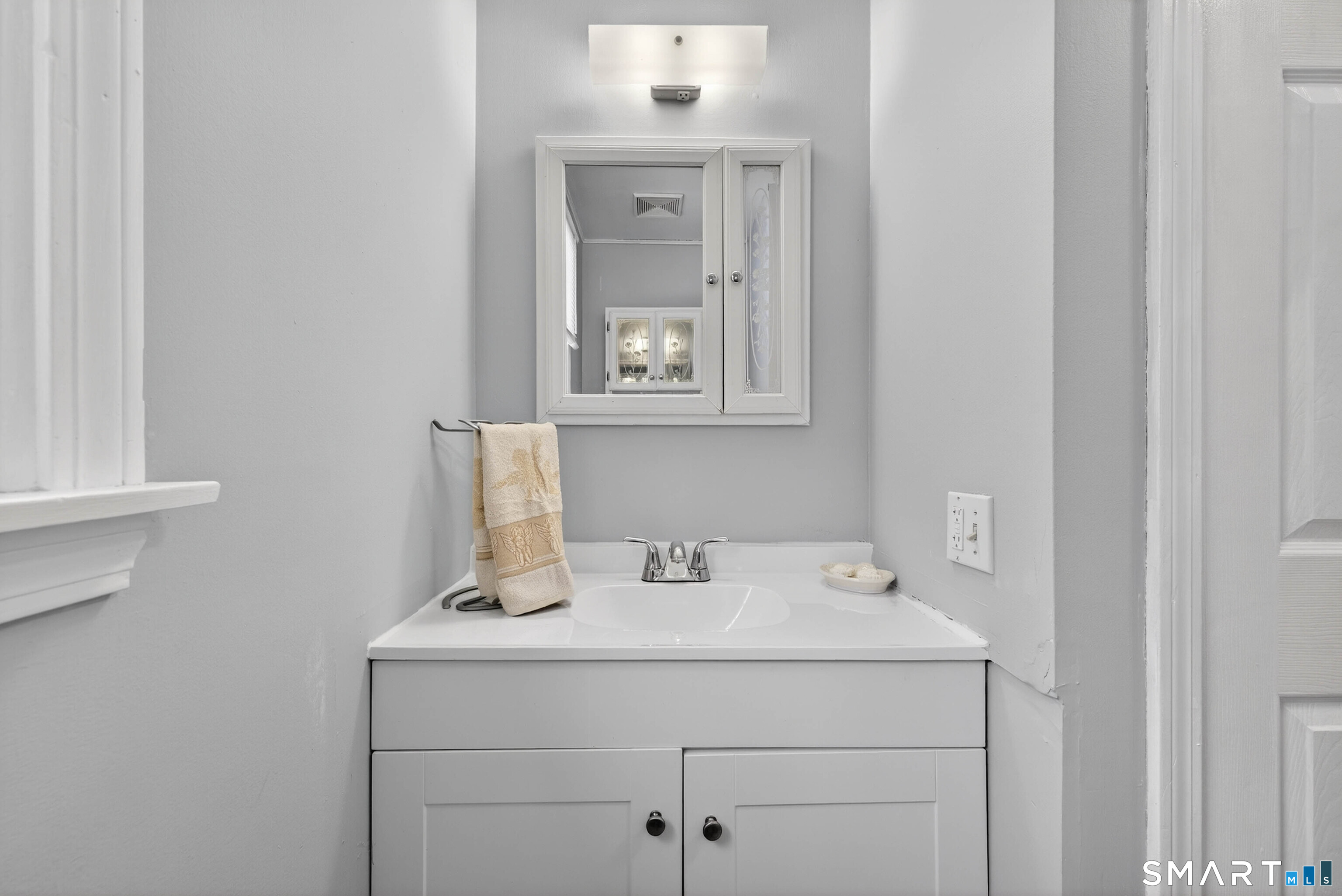 63 Spice Hill Drive Meriden, CT 06451 - Photo 14 of 30 a bathroom with a sink and a vanity