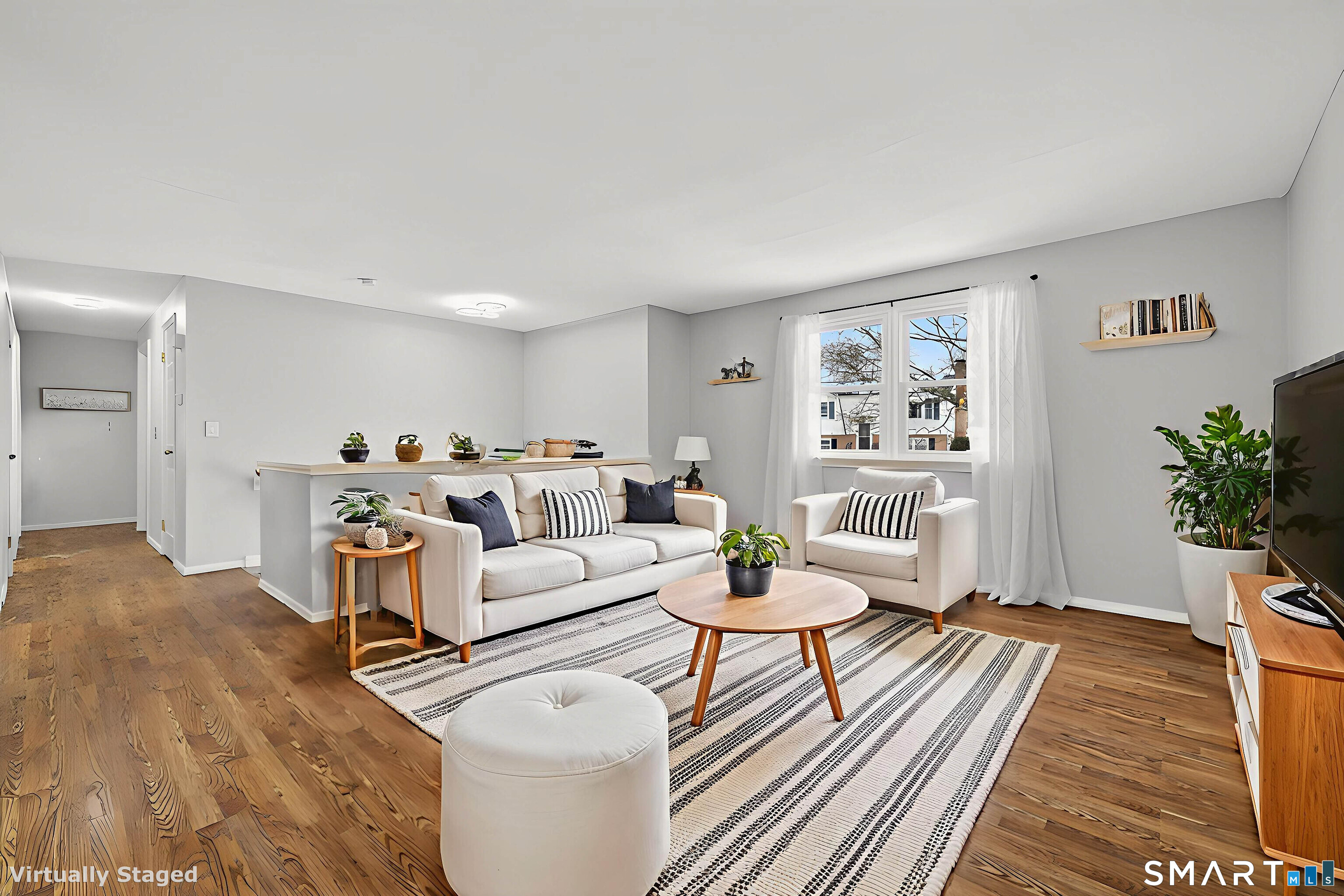 63 Spice Hill Drive Meriden, CT 06451 - Photo 3 of 30 a living room with furniture and wooden floor
