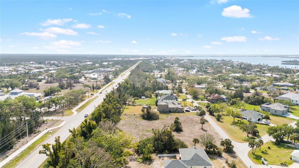 70 Spaniards Road Placida, FL 33946 - Photo 12 of 21 an aerial view of city and lake