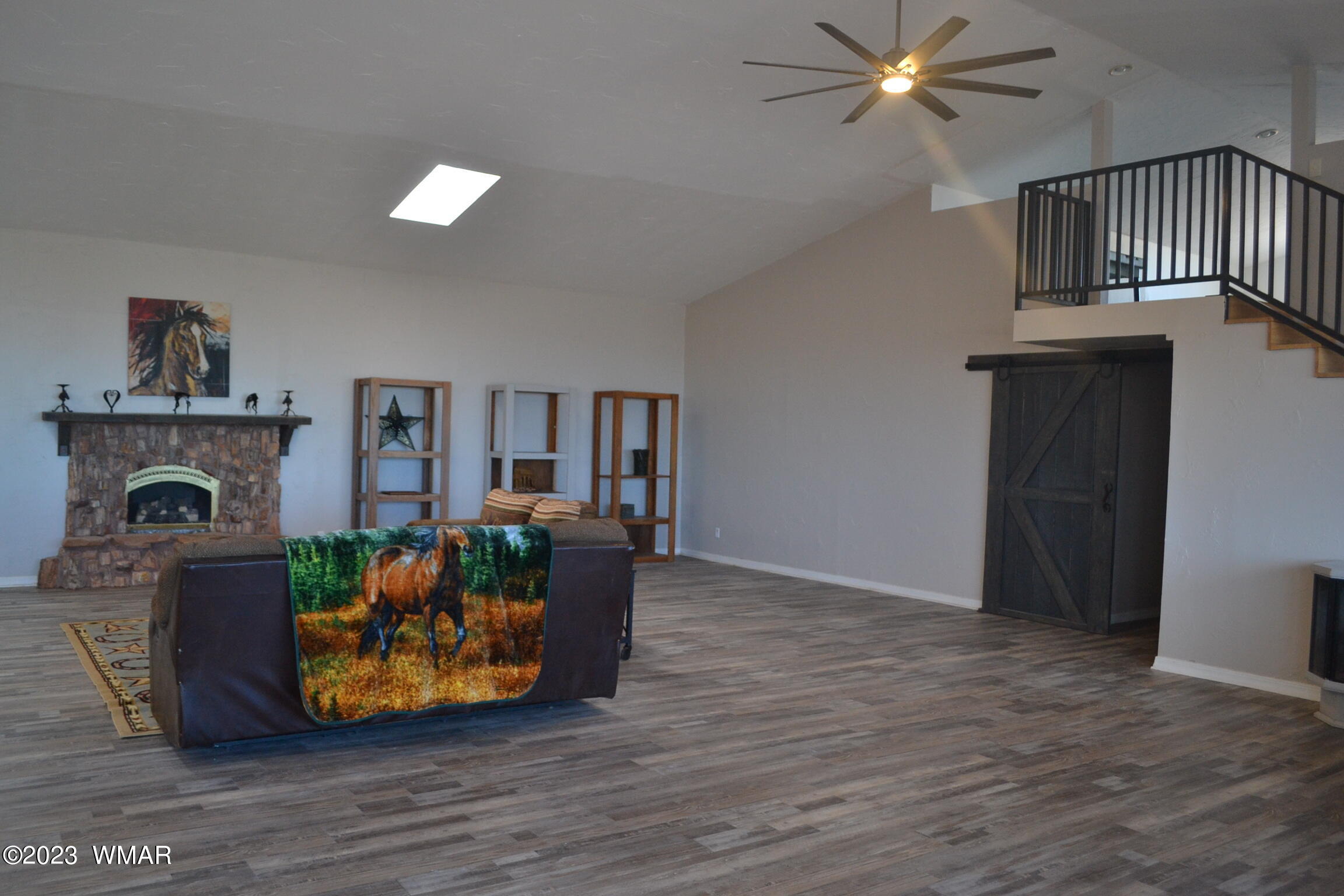 5661 Valley Road Snowflake, AZ 85937 - Photo 12 of 55 a living room with furniture and a fireplace