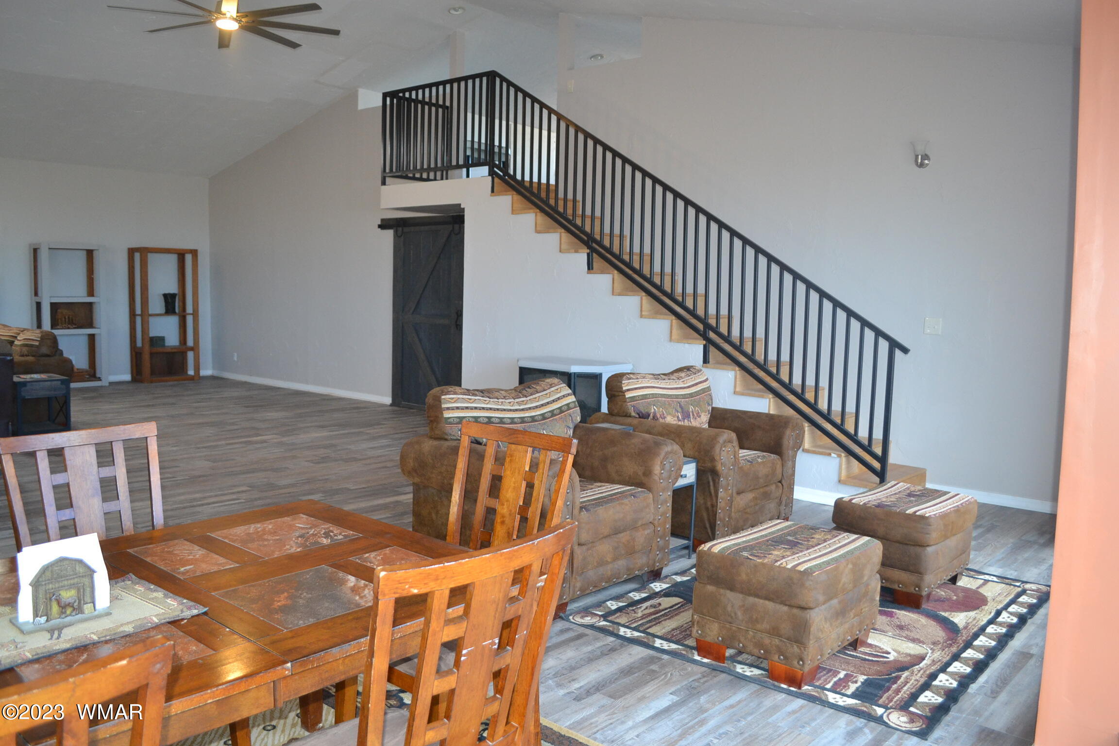 5661 Valley Road Snowflake, AZ 85937 - Photo 13 of 55 a view of entryway dining room and hall with wooden floor