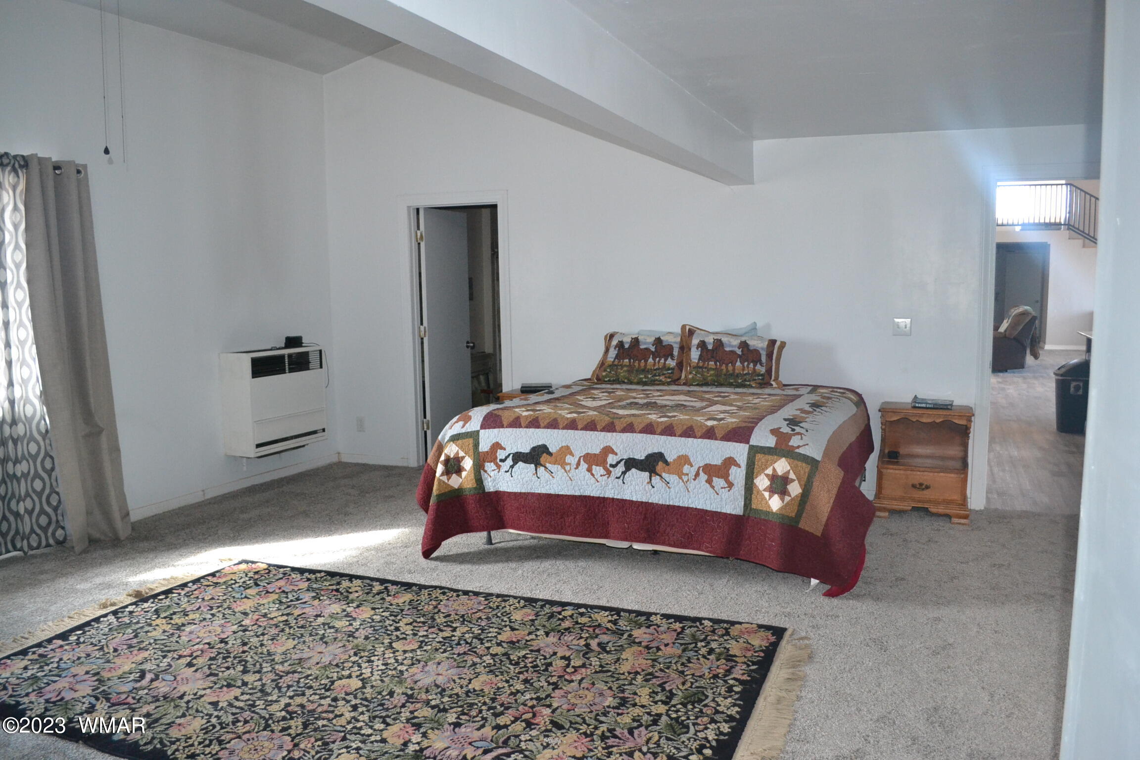5661 Valley Road Snowflake, AZ 85937 - Photo 17 of 55 a bedroom with a bed and a window