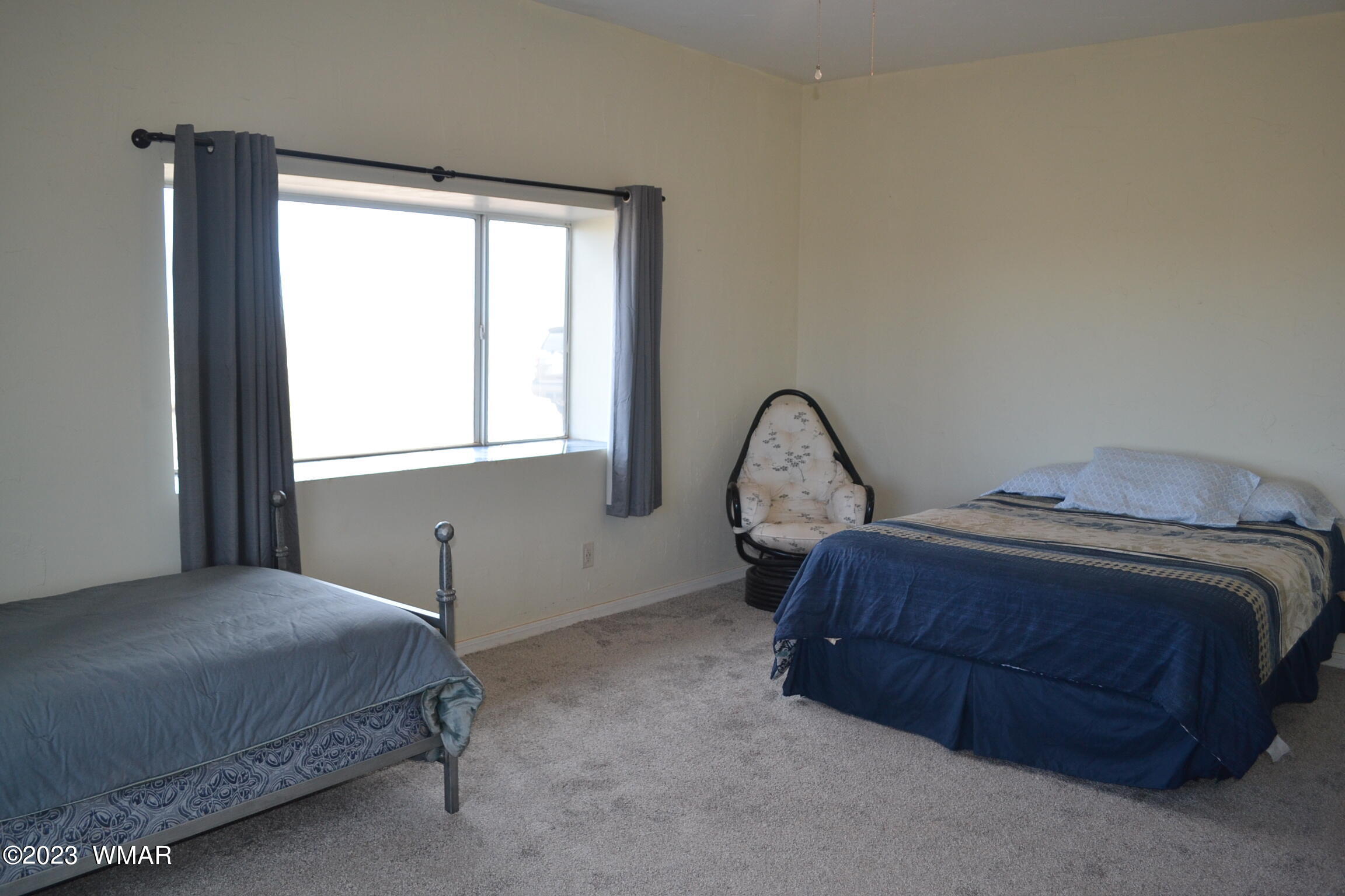 5661 Valley Road Snowflake, AZ 85937 - Photo 21 of 55 a bedroom with a bed and a window