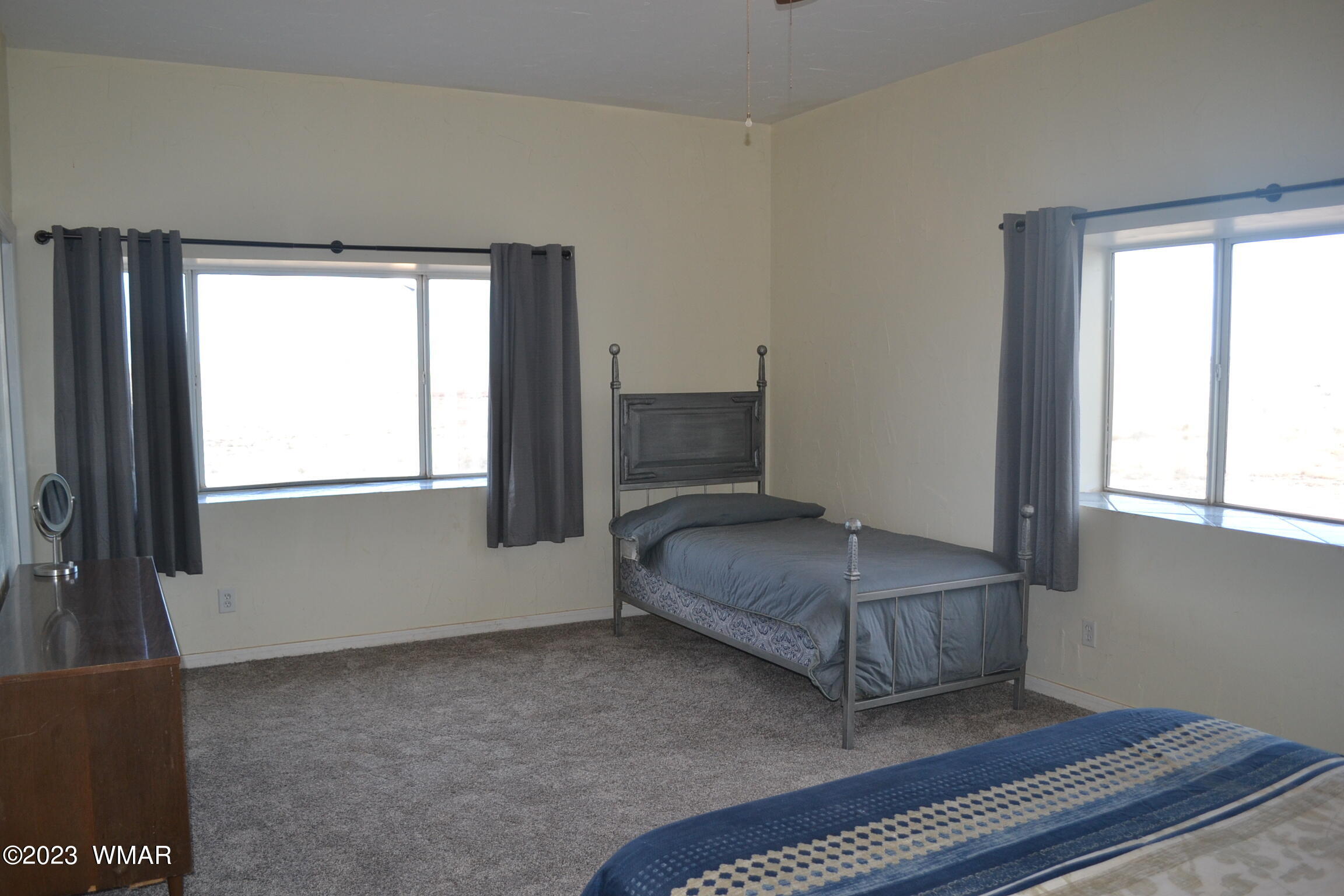 5661 Valley Road Snowflake, AZ 85937 - Photo 22 of 55 a bedroom with a bed and a window