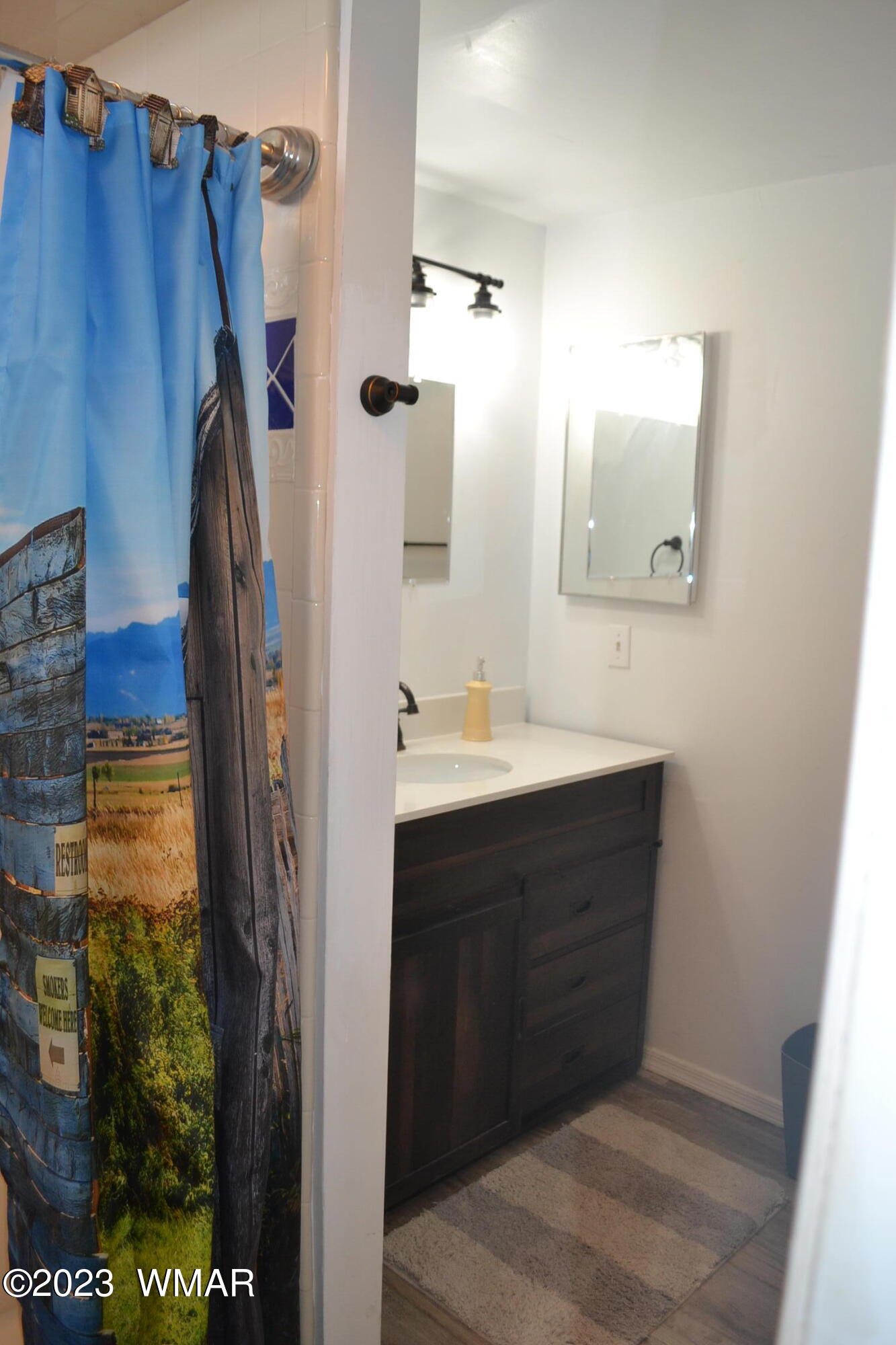 5661 Valley Road Snowflake, AZ 85937 - Photo 26 of 55 a bathroom with a sink and a mirror