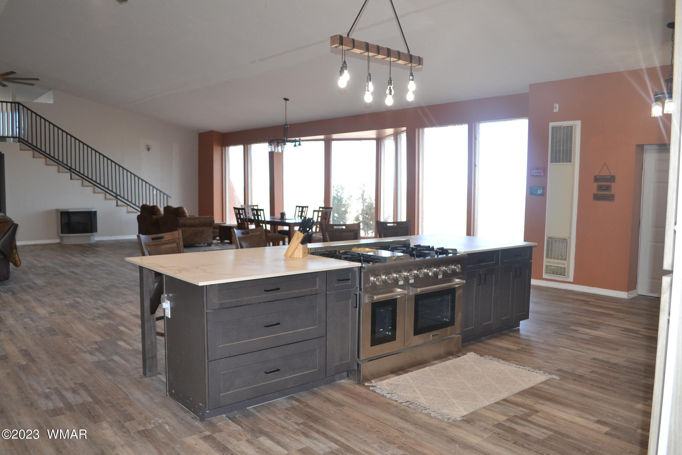 5661 Valley Road Snowflake, AZ 85937 - Photo 30 of 55 a kitchen with stainless steel appliances granite countertop a sink stove and a refrigerator