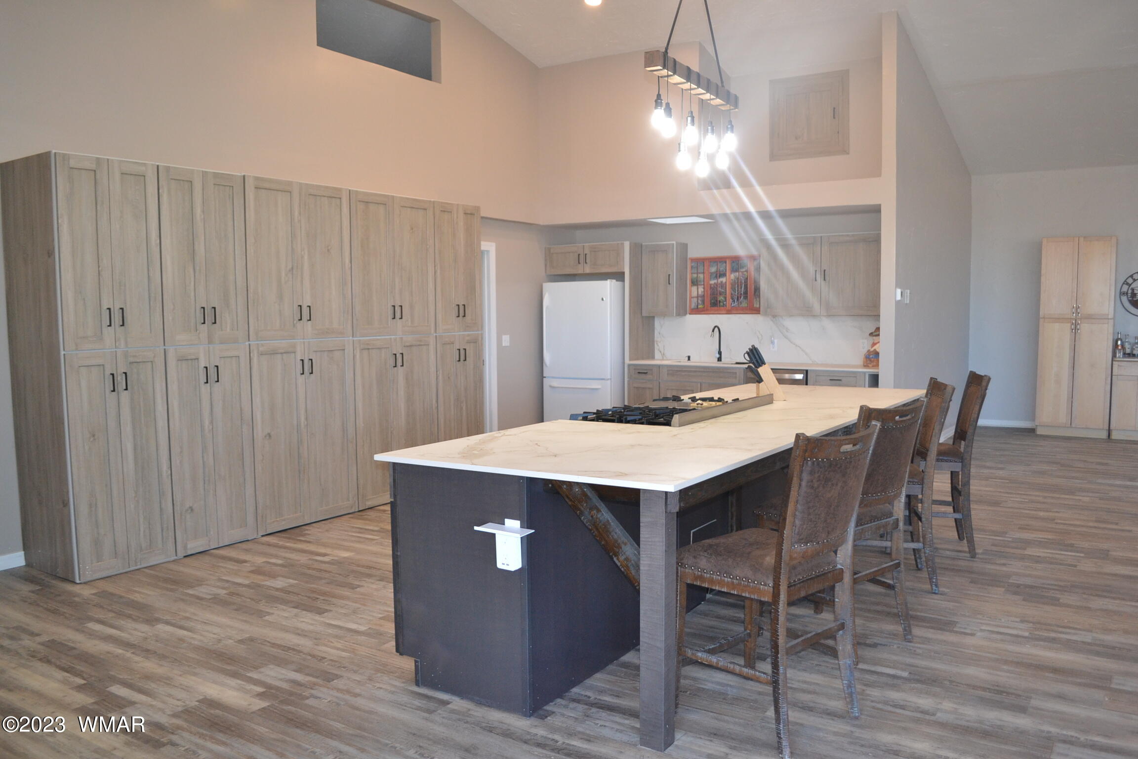 5661 Valley Road Snowflake, AZ 85937 - Photo 31 of 55 a open kitchen with a table and chairs in it