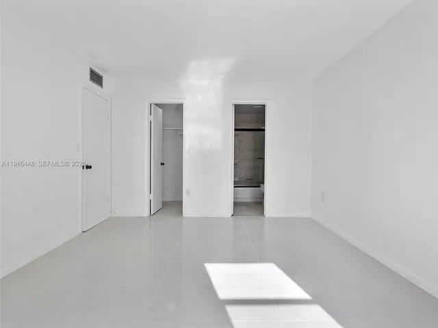 an empty room with an entryway