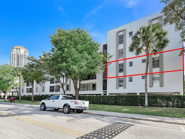 a car parked in front of a house