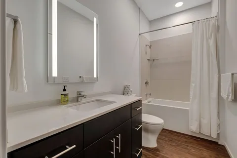 a bathroom with a bath tub