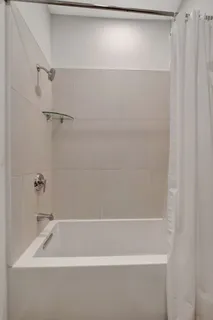 a view of balcony with furniture