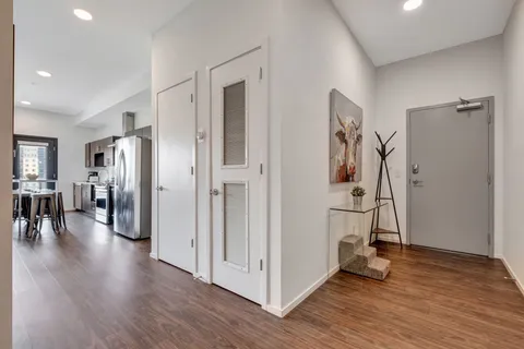 a view of livingroom with hardwood floor and a ceiling fan