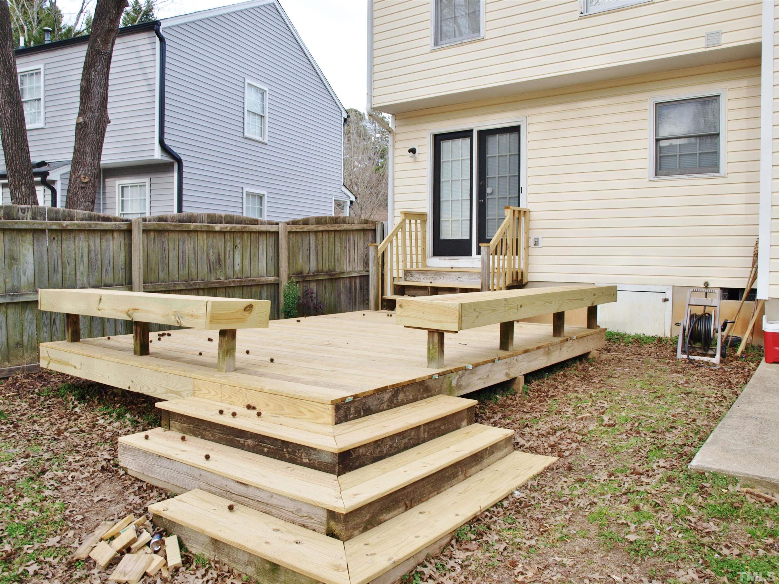 4621 Fox Road Raleigh, NC 27616 - Photo 13 of 14 a view of a dinning table and chairs in the patio