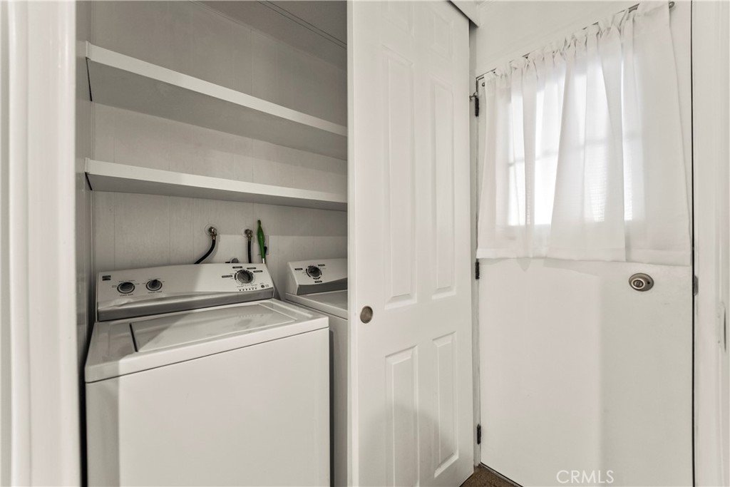 24001 Muirlands Boulevard, Unit 81 Lake Forest, CA 92630 - Photo 19 of 24 Laundry off of kitchen