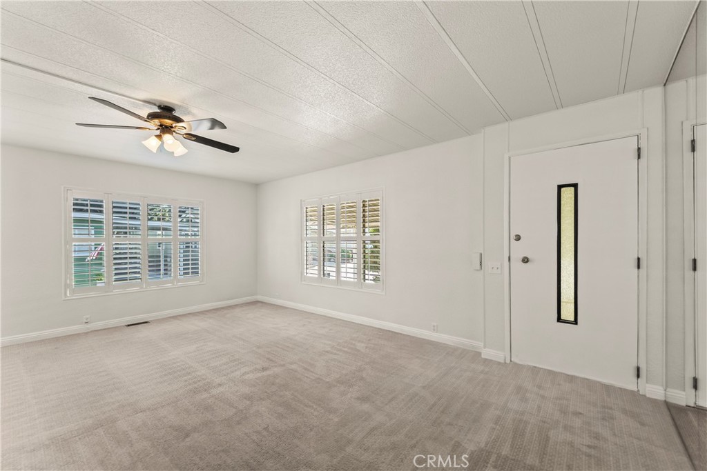 24001 Muirlands Boulevard, Unit 81 Lake Forest, CA 92630 - Photo 10 of 24 Living room