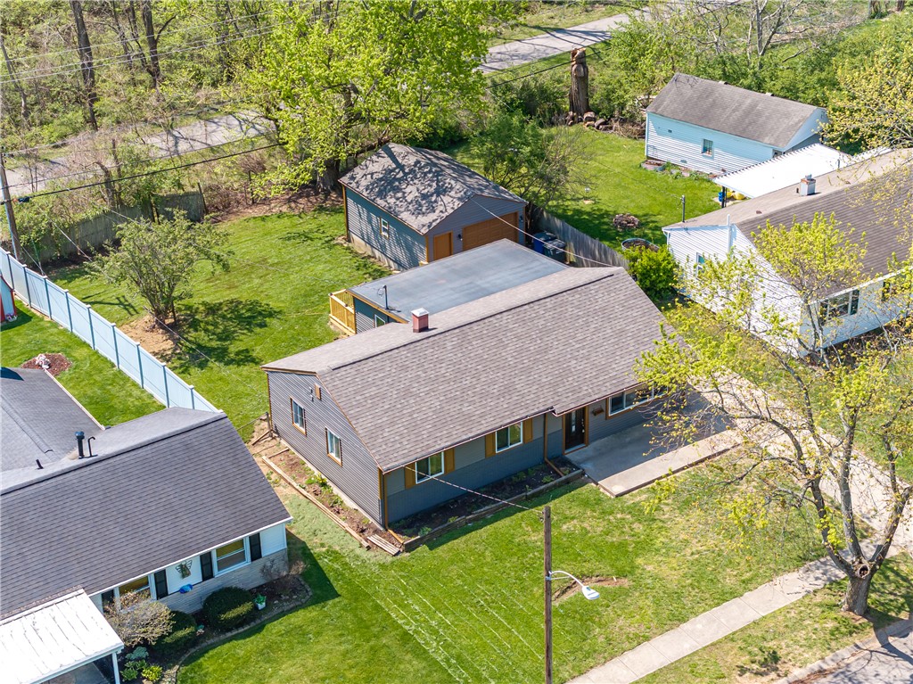 5240 Haverfield Road Dayton, OH 45432 - Photo 51 of 58 This elevated view captures the well-maintained exterior of a charming residential property.