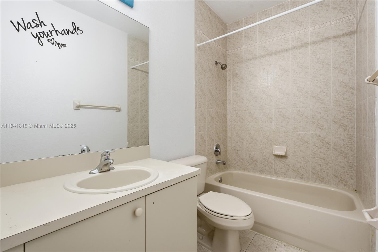 21460 Southwest 85th Passage Cutler Bay, FL 33189 - Photo 17 of 20 a bathroom with a sink toilet and shower