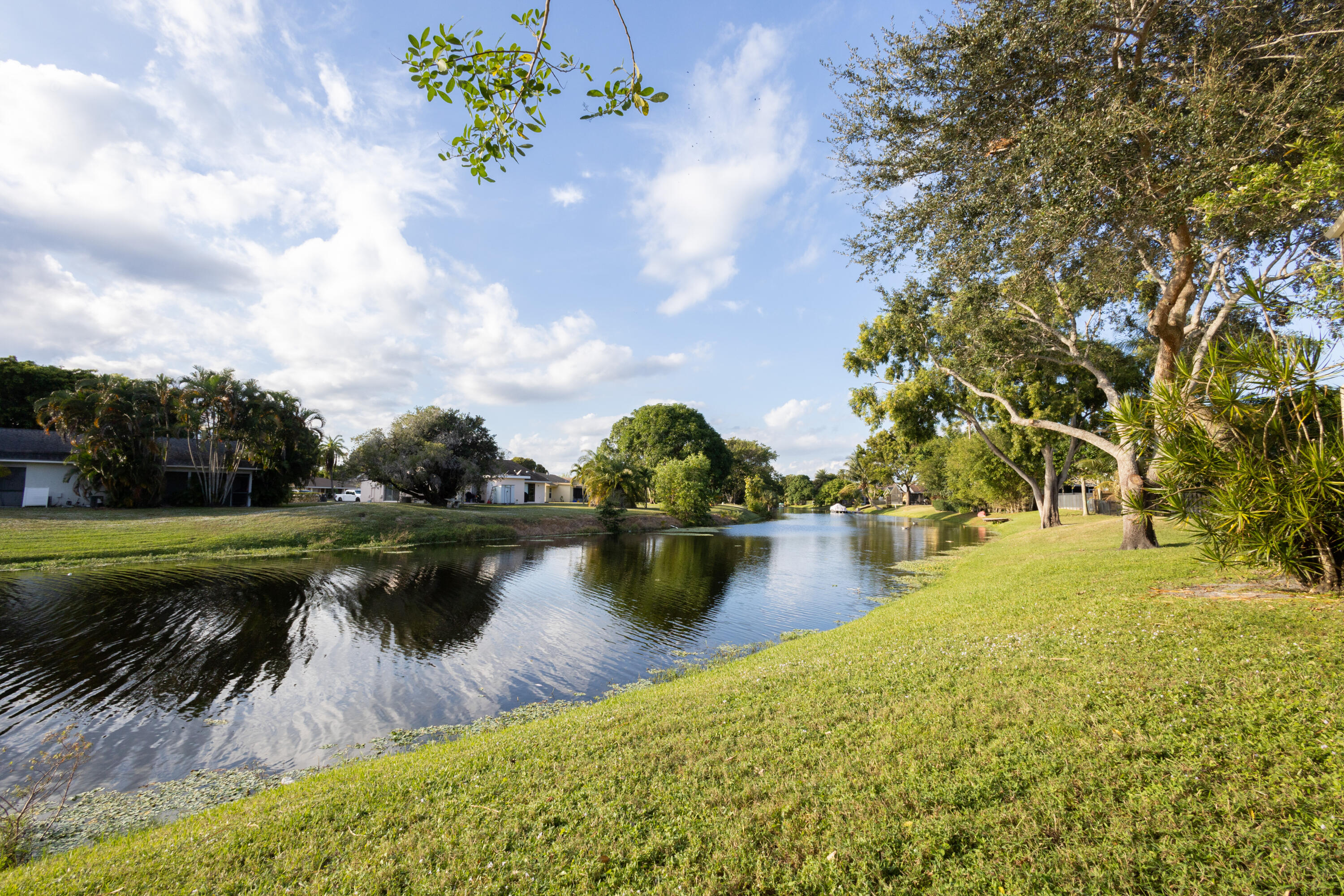 1640 Shaker Circle Wellington, FL 33414 - Photo 3 of 14 a view of a lake in a city