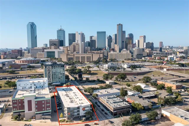 a view of city and a tall buildings