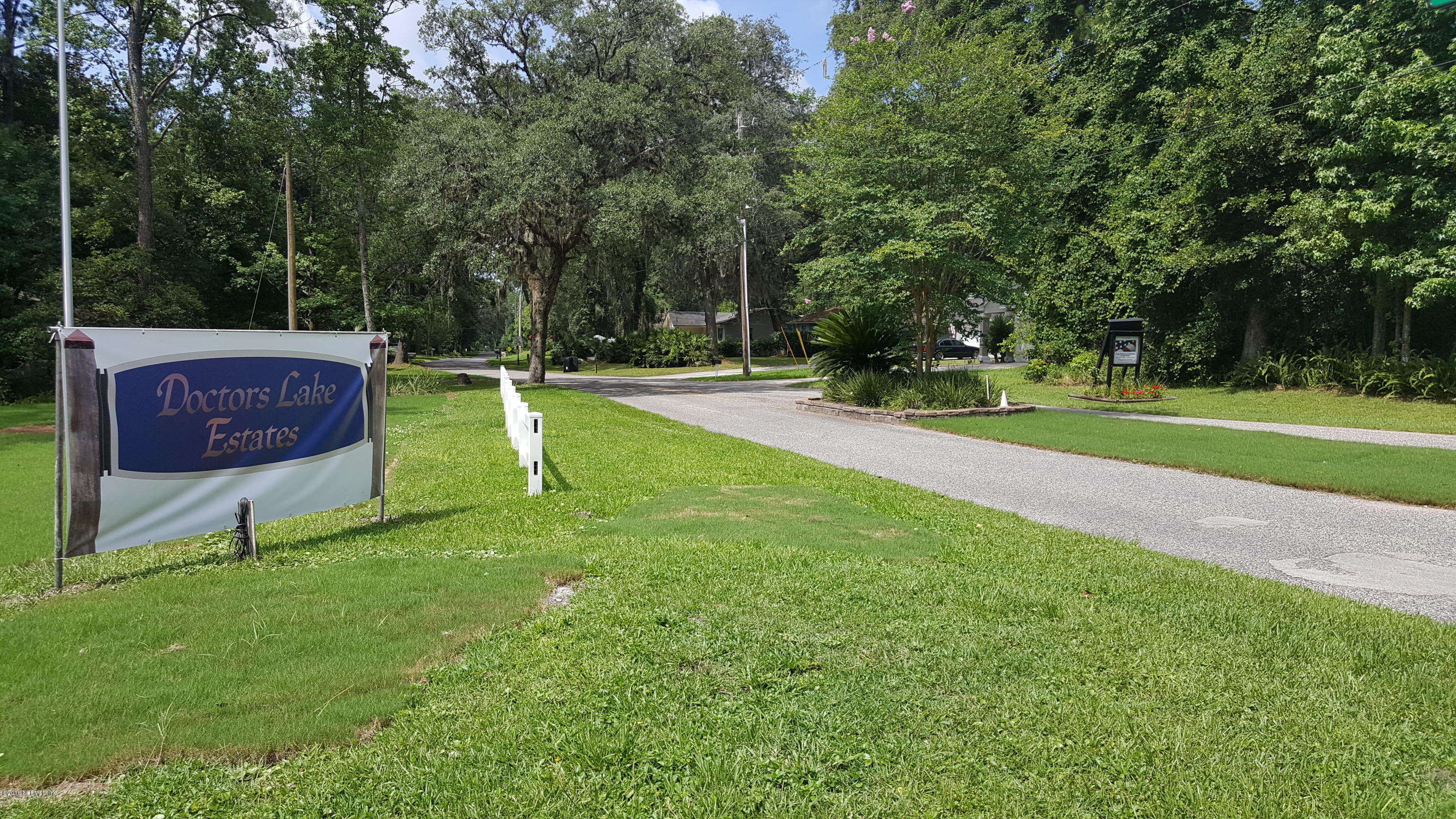 2970 Oak Road Orange Park, FL 32065 - Photo 3 of 4 a view of a backyard with swimming pool