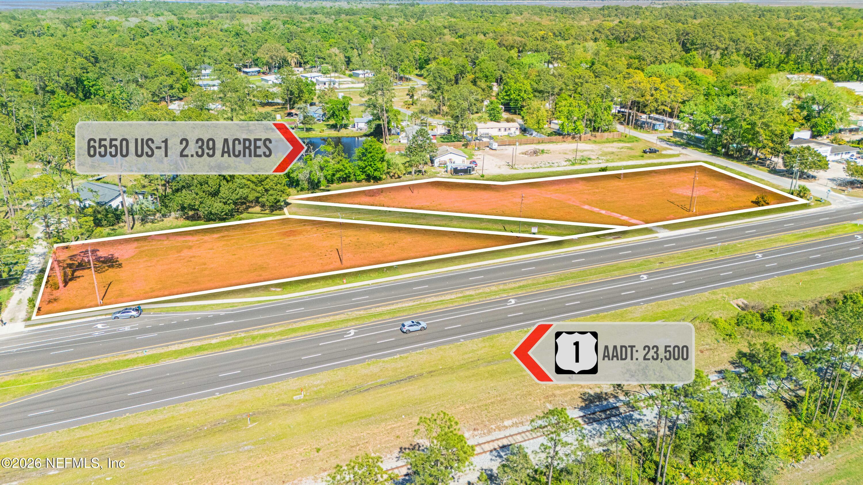 6550 Highway 1 St. Augustine, FL 32095 - Photo 3 of 6 a sign board with an ocean view