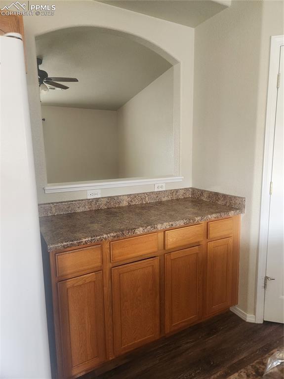 4806 Rusty Nail Point, Unit 202 Colorado Springs, CO 80916 - Photo 10 of 24 Detailed view of wood finished floors and a ceiling fan
