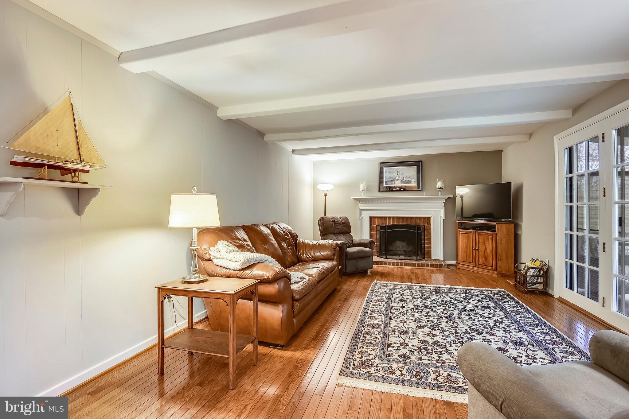 Kitchen opens to the Fam.Room w/ fireplace