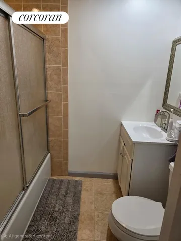 a bathroom with a sink a toilet a mirror and shower