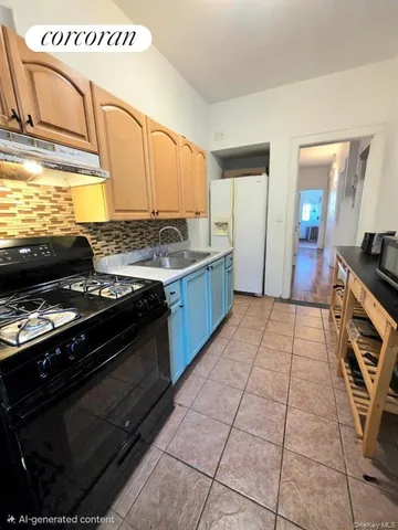 a kitchen with granite countertop cabinets and white appliances
