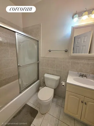 a bathroom with a toilet sink and a shower
