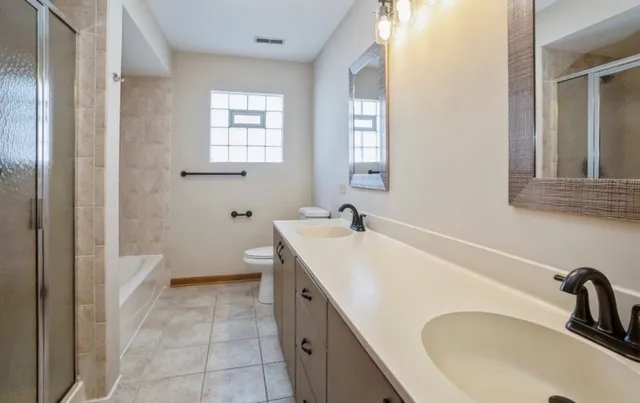 a bathroom with a sink and toilet