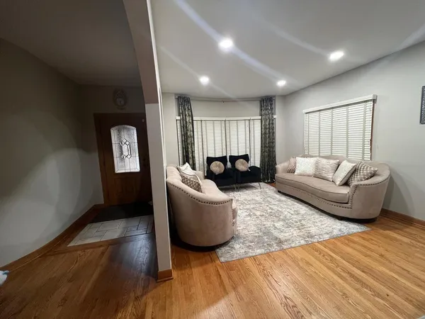 a living room with furniture and a couch