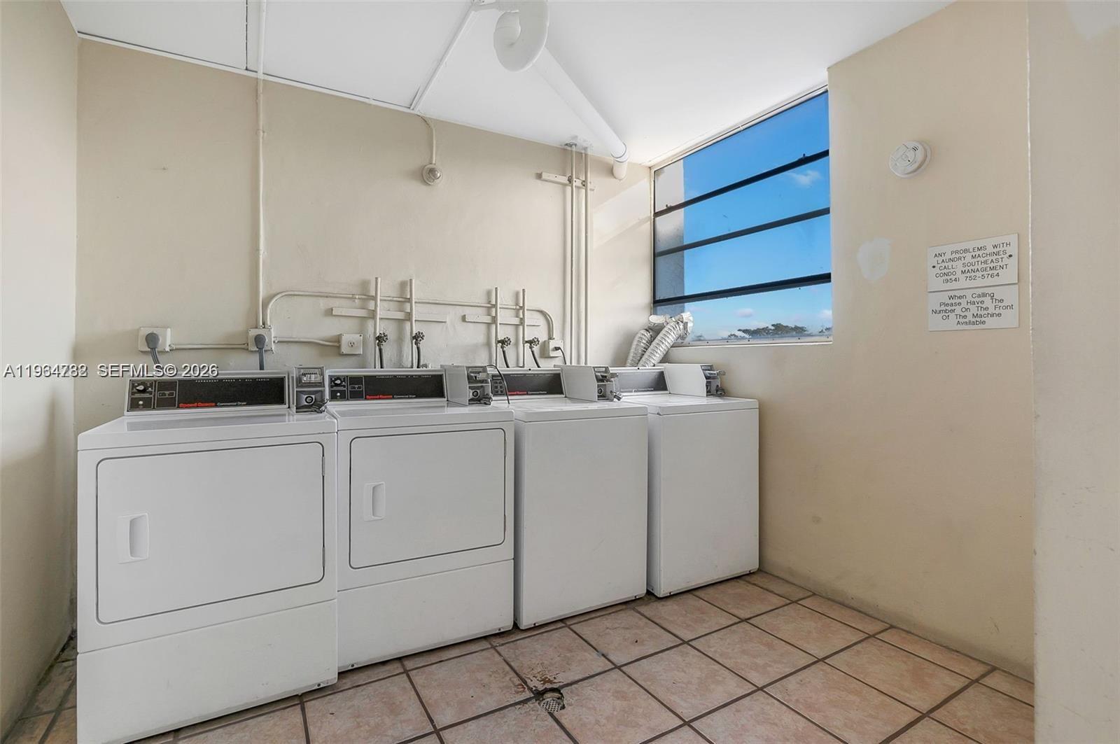 2501 Riverside Drive, Unit 307A Coral Springs, FL 33065 - Photo 19 of 29 a room with a sink and cabinets