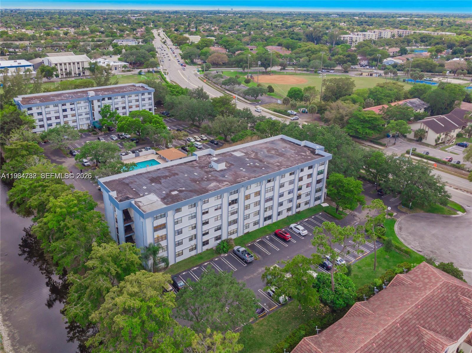 2501 Riverside Drive, Unit 307A Coral Springs, FL 33065 - Photo 26 of 29 an aerial view of a house with a garden