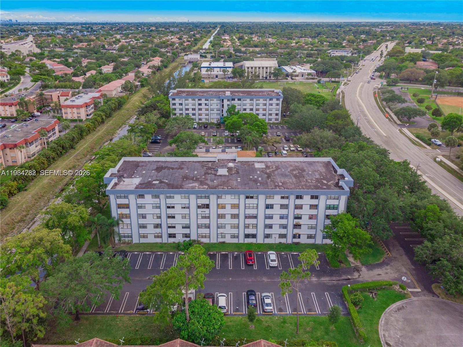 2501 Riverside Drive, Unit 307A Coral Springs, FL 33065 - Photo 27 of 29 an aerial view of a house with a garden