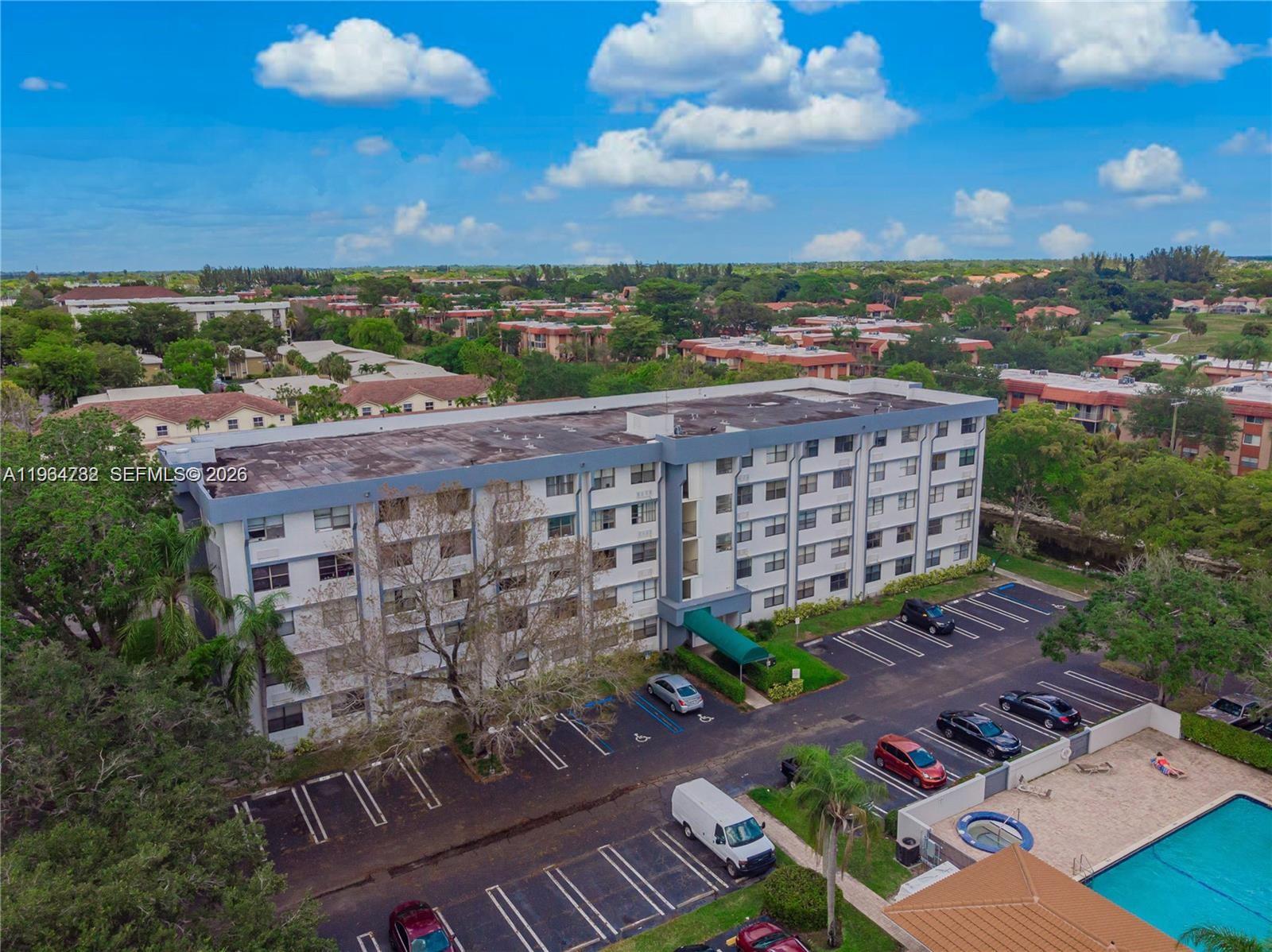 2501 Riverside Drive, Unit 307A Coral Springs, FL 33065 - Photo 28 of 29 an aerial view of a building