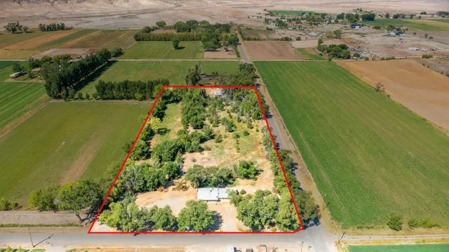 an aerial view of a houses with outdoor space