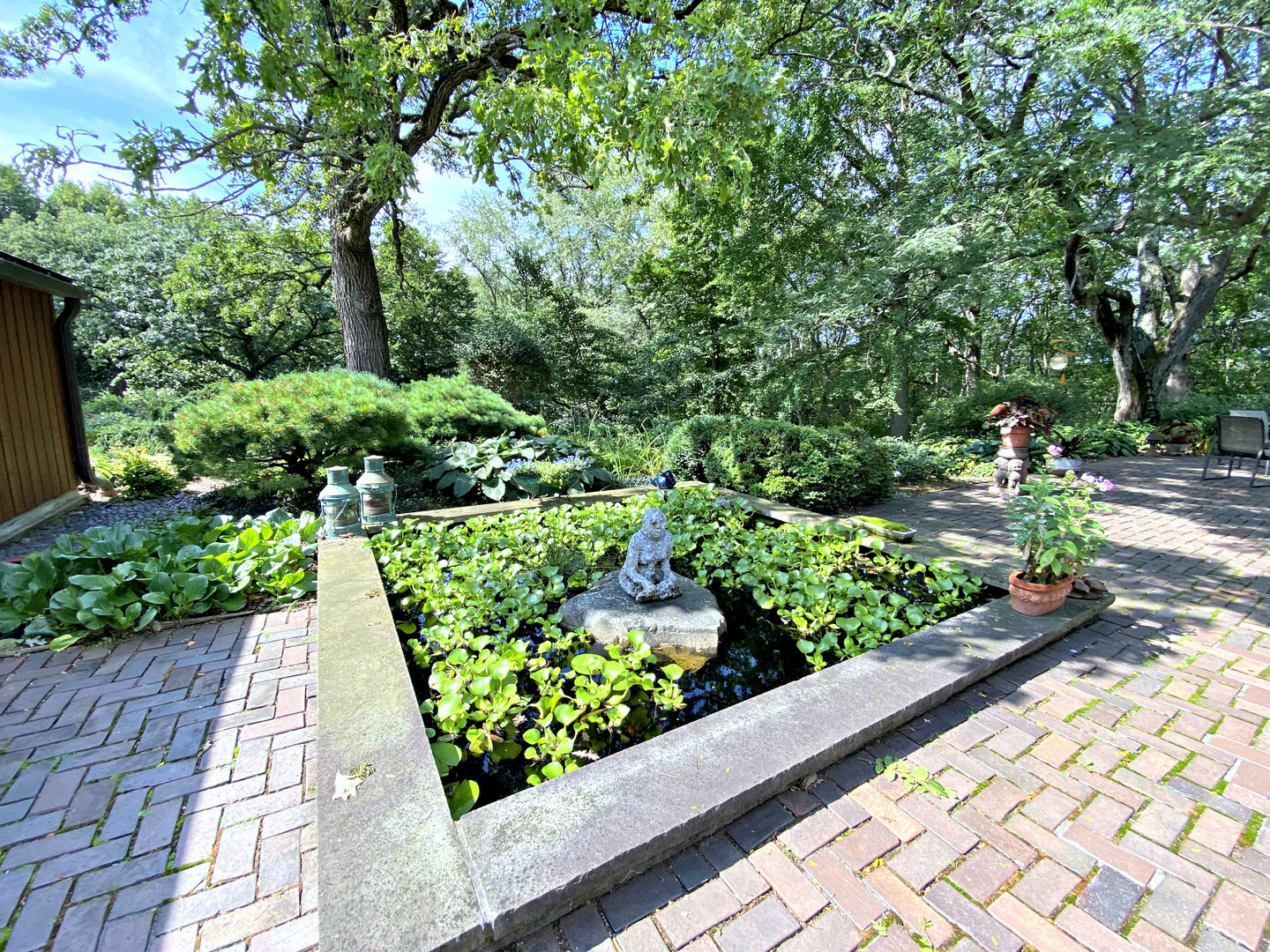 2109 Paulsen Road Harvard, IL 60033 - Photo 58 of 76 a view of a garden with wooden bench