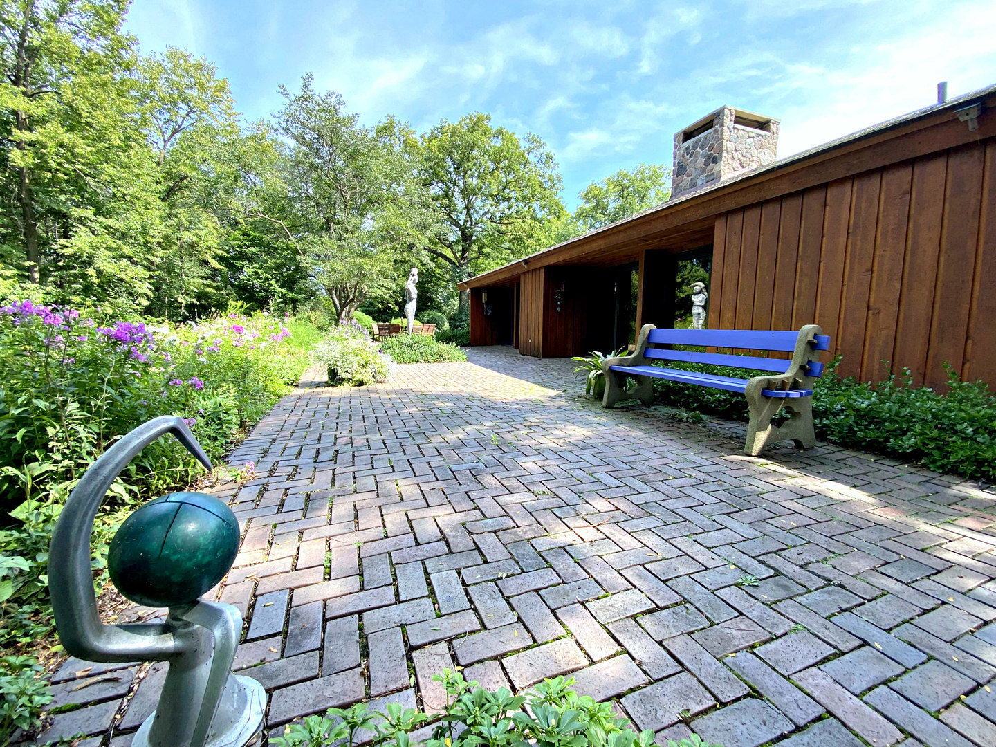 2109 Paulsen Road Harvard, IL 60033 - Photo 59 of 76 a view of backyard with seating space and trees in the background